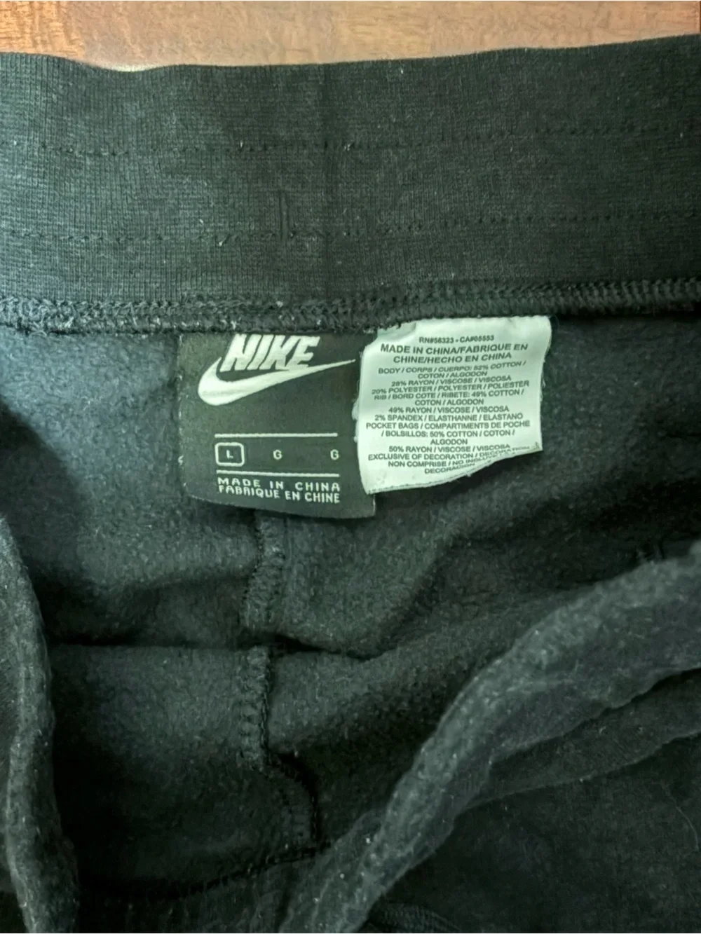 Nike Black Kids Sweatpants with White Swoosh